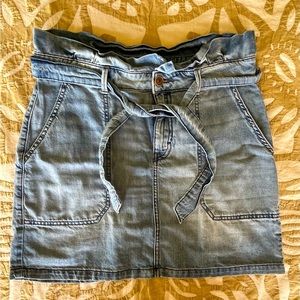 Adorable denim mini skirt with belt and waist ruffle